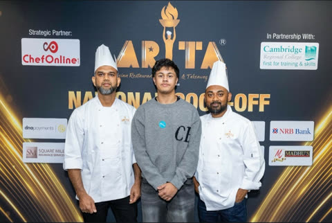 Two chefs and a guest in front of the ARTA National Cook-Off backdrop.